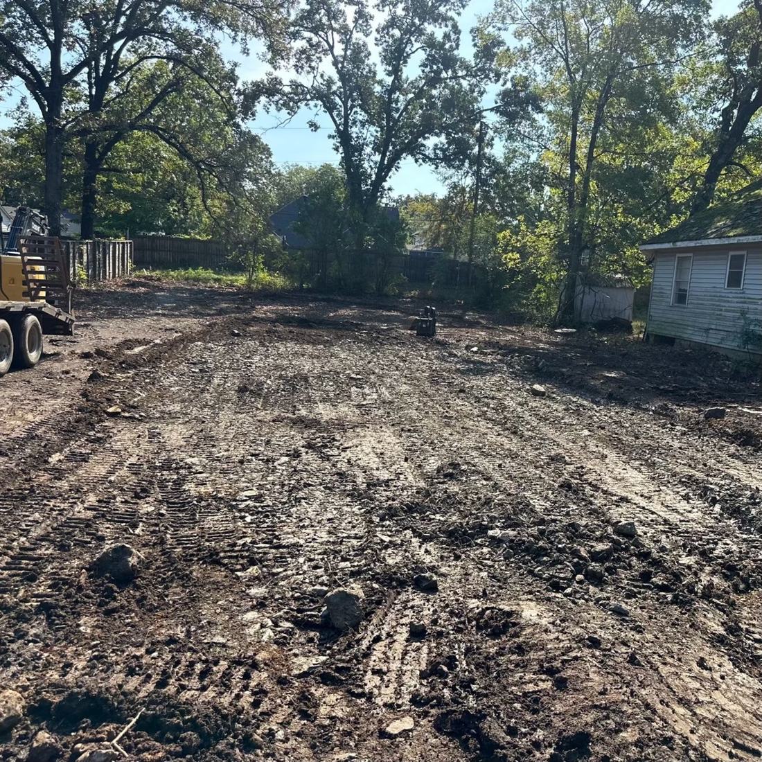 The same Little Rock lot after Bratchco removed the house — cleared, hauled off, and graded